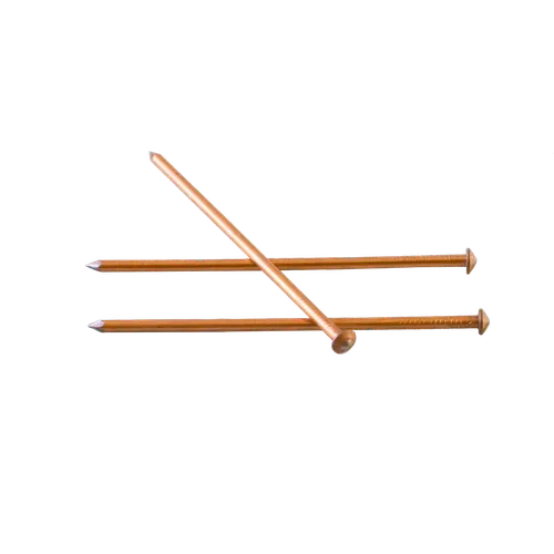 Three copper-colored nails on a black background